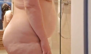 Pregnant Saskialove does it herself in the shower and cums